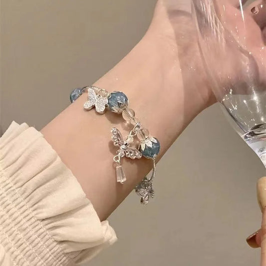 Hemelsblauwe Vlinderarmband met Bloemenmotief - Lila